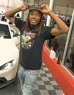 Fetty Wap in the music video for Slide, a song by Bs.Ballout which Fetty Wap features on