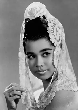 Image 13 Baby Huwae Photograph credit: Tati Photo Studio; restored by Chris Woodrich Baby Huwae (22 November 1939 – 5 June 1989) was an Indonesian model, film actress and singer. Born in Rotterdam, Netherlands, she moved to Indonesia, where she took up modelling, by the 1950s. She entered the film industry in 1958, and gained popularity following the success of Asrama Dara. Over the next few years, Huwae acted in a further five films and established a girl group, the Baby Dolls, with several actresses who had appeared in her second film. She made a guest appearance in one more film in 1971 after a ten-year hiatus. More selected pictures