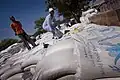 Bags of food aid, donated by the Australian Government, are piled up at a food distribution point in Epworth, in Harare, Zimbabwe on 23 April 2009.
