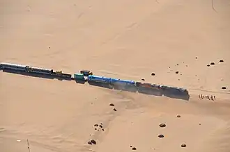 Track from Swakopmund to Walvis Bay covered by sand 22°47′17″S 014°35′20″E / 22.78806°S 14.58889°E / -22.78806; 14.58889