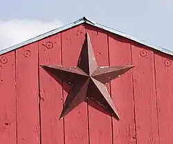 Barnstars are a common element of primitive decorating
