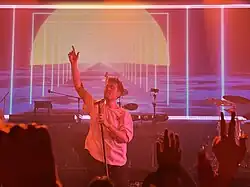 Dan Smith of Bastille singing at the Soundstage at Graceland