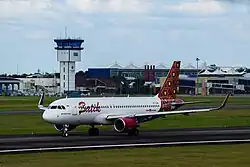 A Batik Air Airbus A320 landing in Sultan Mahmud Badaruddin II International Airport