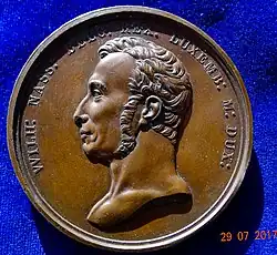 William I in March 1815 as King of the Belgians and Grand Duke of Luxembourg on a bronze medal by Michaut, obverse.