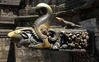 Gold spout of Nag Pokhari in Bhaktapur; a macara with a goat in its mouth