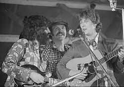 Tony Rice, acclaimed bluegrass guitarist (at R, with David Grisman, mandolin and Bill Keith, banjo) playing his much modified vintage 1935 Martin D-28, serial number 58957, formerly the property of Clarence White, in 1977