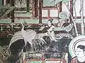 China, mid-Tang Dynasty. Artwork from the Dunhuang Grottos, Yulin Cave number 25 showing a Bird of Life (共命鸟), playing a panpipe.