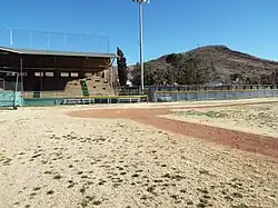 Concrete grandstand and home plate.