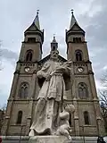 Millennium Church and the statue of John of Nepomuk