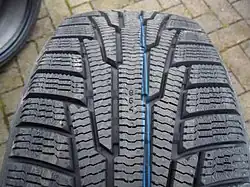 Nokia Hakkapeliitta tread shown with deep treads and many sipes (thin channels) for better winter traction