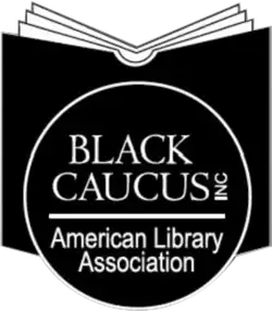 logo of BCALA which is a black circle with the organization's name against a background of an open book, also in black
