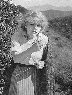 Blanche Sweet wearing simple clothing while outdoors