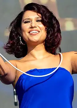 Raye performing in 2023