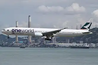 A Boeing 777-367ER (B-KPL) in Oneworld special livery