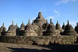 Image 43Stupas on upper terraces of Borobudur temple in Central Java. (from Tourism in Indonesia)