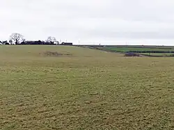 Group of three bowl barrows 180 m south of Tyning's Farm: part of the Tyning's Farm round barrow cemetery