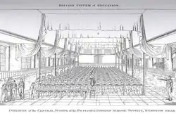 Illustration of a classroom; a number of older children are helping a teacher to instruct a very large class.