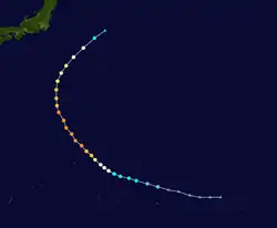 A track map showing the path of a typhoon over the western Pacific Ocean. Initially moving to the west-northwest, it executes a protracted, smooth curve to the northeast while located well to the southeast of Japan.