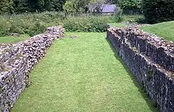 Remains of the lay brothers' range to the west of the cloister, showing the substantial undercroft.