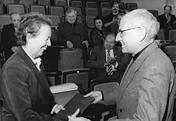 black-and-white image of Manfred Wekwerth on right, with Ruth Berghaus on left
