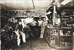 Byars (2nd from right) standing with friends.