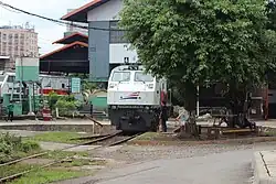 A CC203 locomotive undergoing a head turn at the Jatinegara Depot