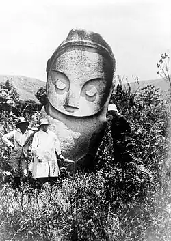 Image 90A megalithic statue in the Bada Valley, Lore Lindu National Park, Central Sulawesi.Estimated to be up to 5,000 years old, these stone figures are part of a little-understood prehistoric culture. Dozens of megaliths with human-like and abstract forms are found throughout the region. (from History of Indonesia)