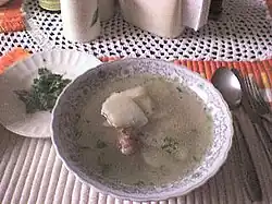 Caldo de costilla served hot and with cilantro leaves