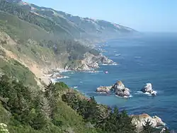 Big Sur - Midcounty coastline with the McWay Rocks in foreground