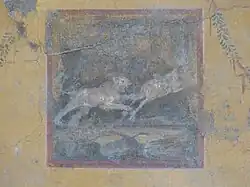Closeup of panel painting with hunt scene