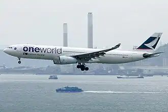 An A330-343 (B-HLU) in Oneworld special livery