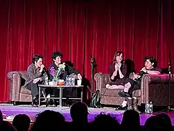 From left to right, Josette Mankin, Naomi McPherson, Katie Gaskin, Celeste Yim sitting on couches on stage.