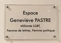 Plaque saying "Espace Genevieve PASTRE: Militante LGBT, Femme de lettres, Femme politique"