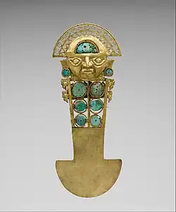 Ceremonial knife (tumi); 10th-13th century; gold, turquoise, greenstone & shell; height: 33 cm (1 ft. 1 in.); Metropolitan Museum of Art