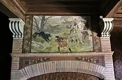 Fireplace decoration depicting a wolf hunt in the castle of Pibrac (France)