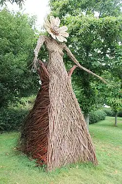 Wickerwork figure of a woman in the grounds