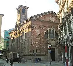 View of the corner between Piazza Dante, via Pretorio, and Via Magatti