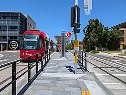 Light rail stop in the middle of a street