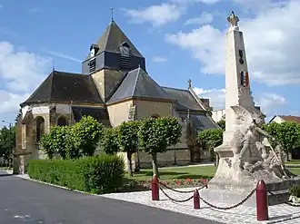 The church and war memorial in Juniville