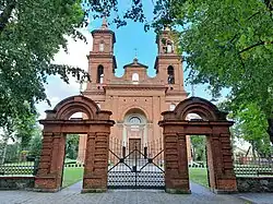 Gates and front façade of the church in 2024