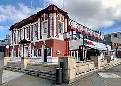 Circa Theatre building view from the waterfront a two story building with mixed architecture styles