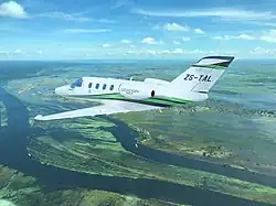 Air Cessna Citation M2 over Kasane, Botswana