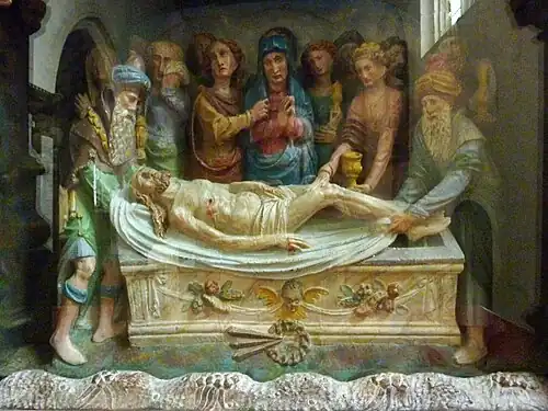 The "mise au tombeau" part of the altarpiece of the main altar.
