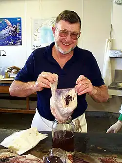 (?/?/1999), Clyde Roper with one of the giant squid's enormous eyes