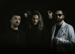 Promotional image from the release of the band's 2022 album Punishing Myself Before God Does