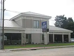 Commercial Capital Bank is located in downtown Delhi across the street from the First Baptist Church.