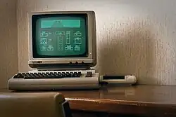Personal computers like the Apple IIe, IBM PC compatibles, Commodore 64 (pictured), and Macintosh 128K were popular in the 1980s.