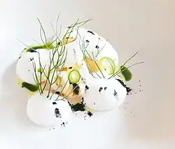 Shrimp covered and topped with coconut and guava