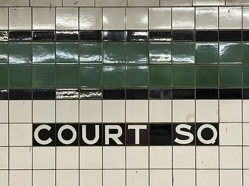 Tile caption below trim line