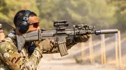 Cypriot MYK operator with his FN SCAR in a live fire exercise with US Navy SEALs
